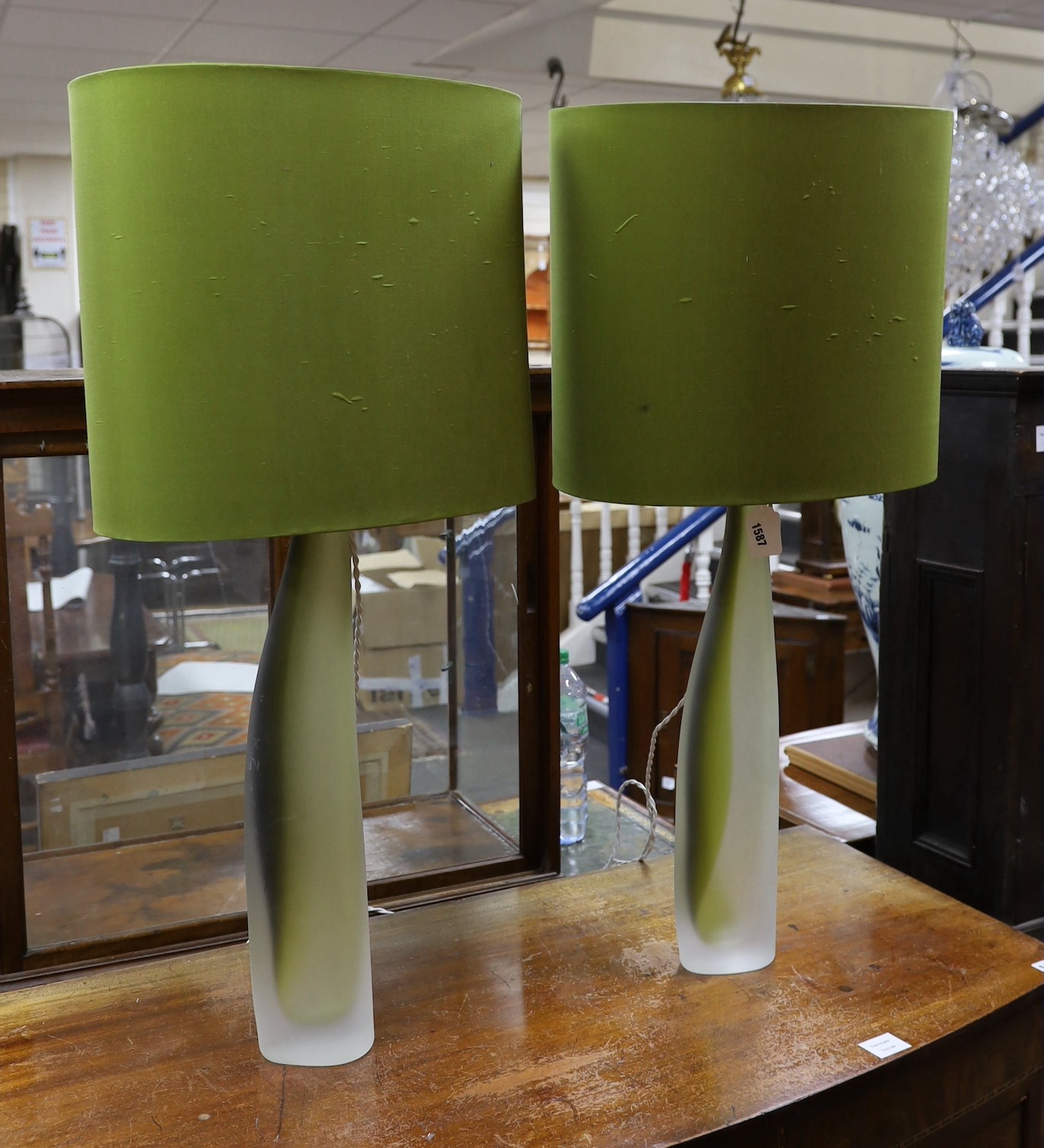 A pair contemporary green and opaque glass table lamps with shades, 90cm total height